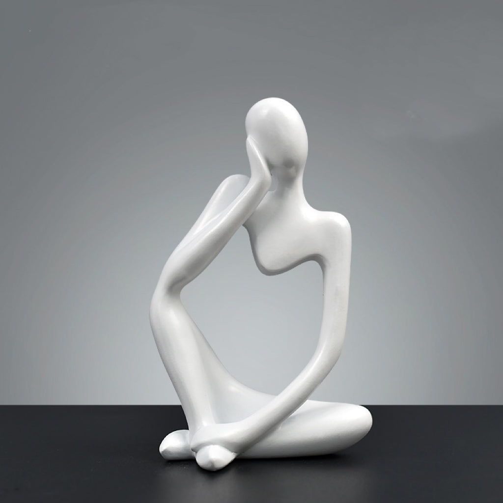 Dekorative Figur Person in sitzender Pose