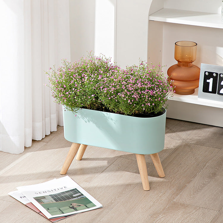 Dekorativer Blumentopf mit Ständer